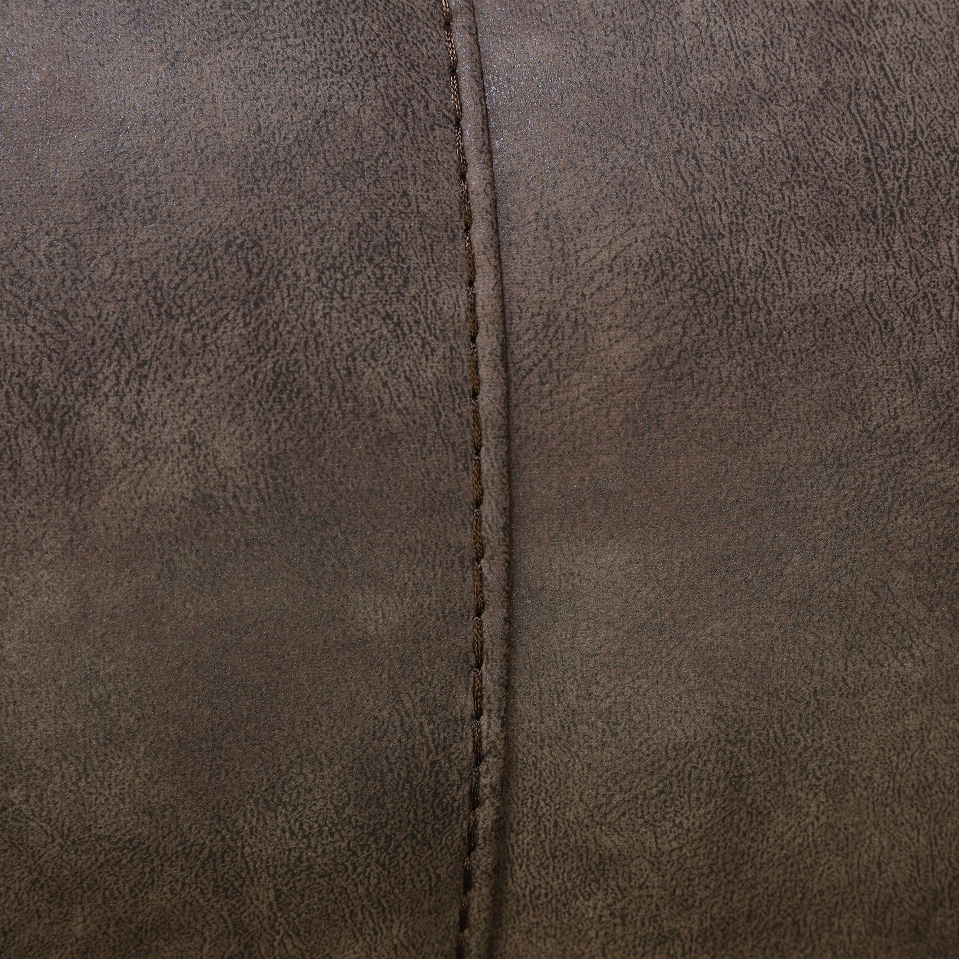 Brown textured upholstery close-up showing vertical seam stitching.