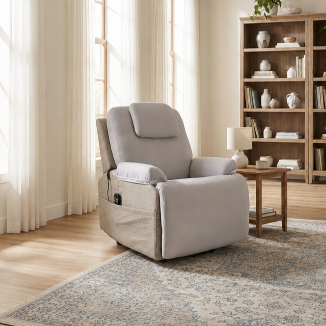 Gray upholstered recliner chair with padded armrests and front storage side pocket