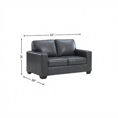 Dark gray leather loveseat with padded arms and two seat cushions