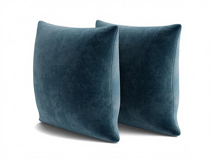 Blue square throw pillows with knife-edge seams, 22 x 22 in, angled view