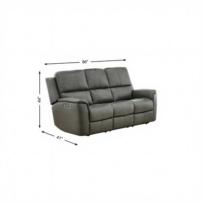 Gray power sofa with drop-down table in left arm, padded back and recline seats